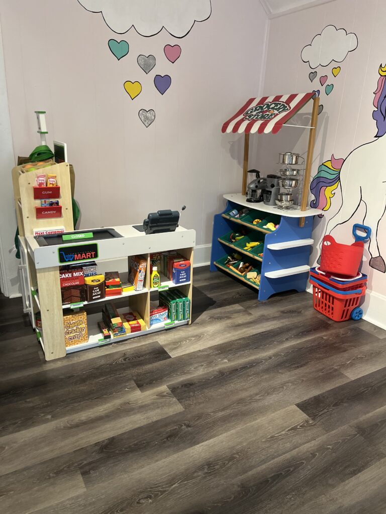 Kids Grocery Store Playset at Playtime Academy Daycare in Davenport, Iowa.